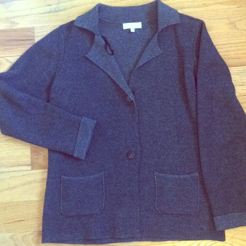 48% merino wool & 7% cashmere. so comfy cardigan